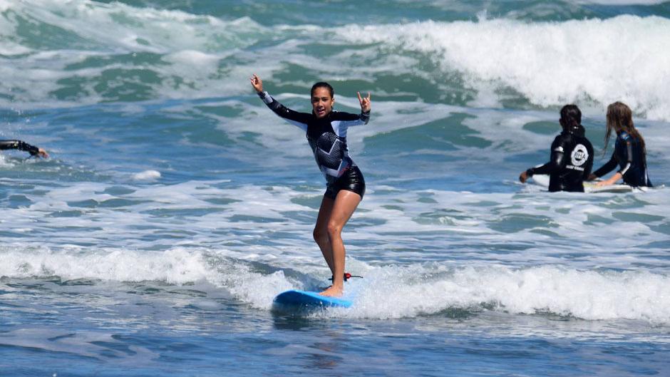 Join the team for a fun day out in the water learning the fundamentals of surfing at Piha Beach!